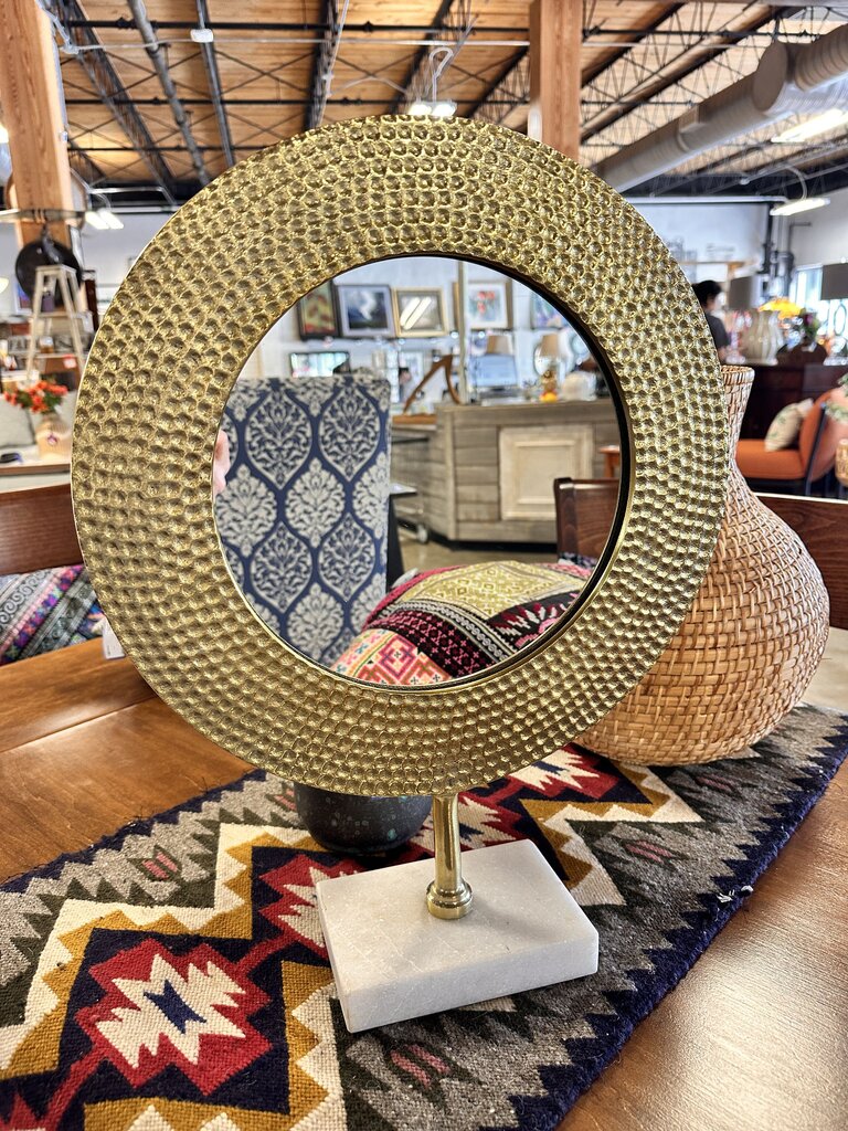 Hammered Bronze Mirror on Marble
