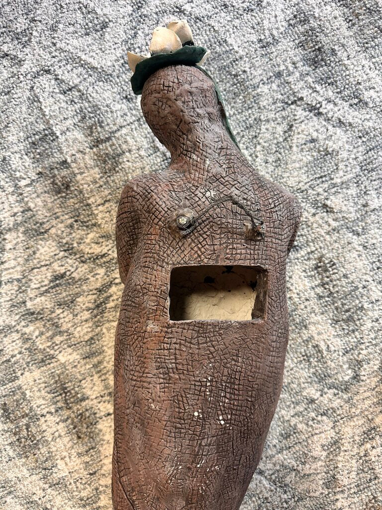 Sculpture Woman Holding Her Heart