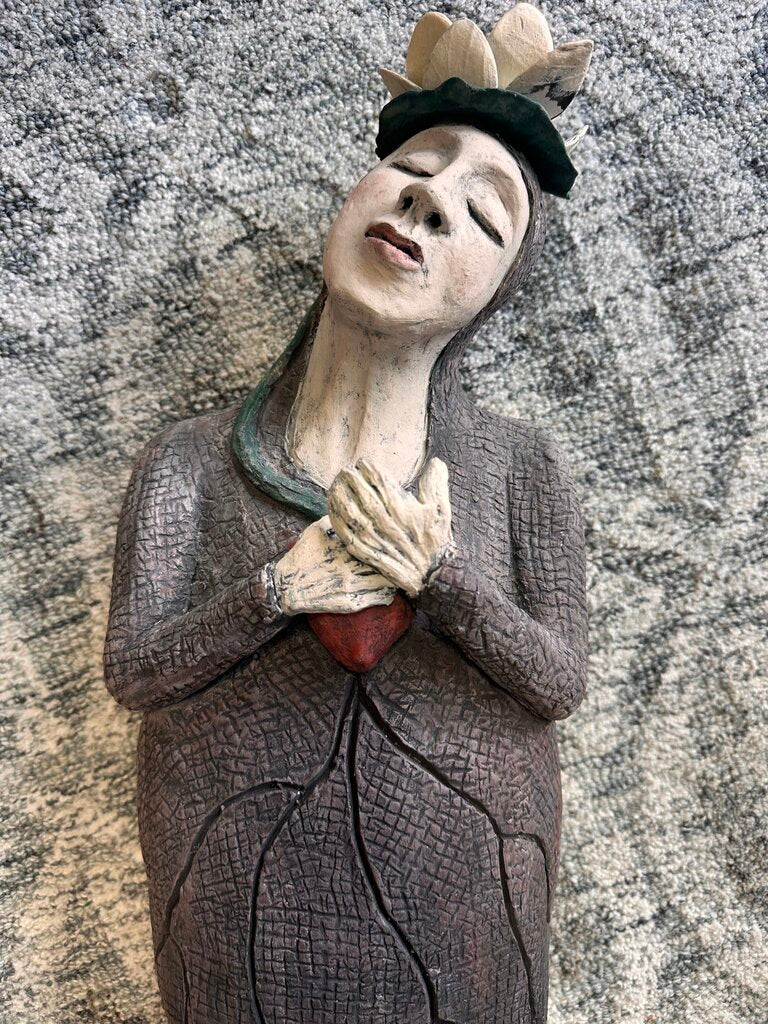 Sculpture Woman Holding Her Heart