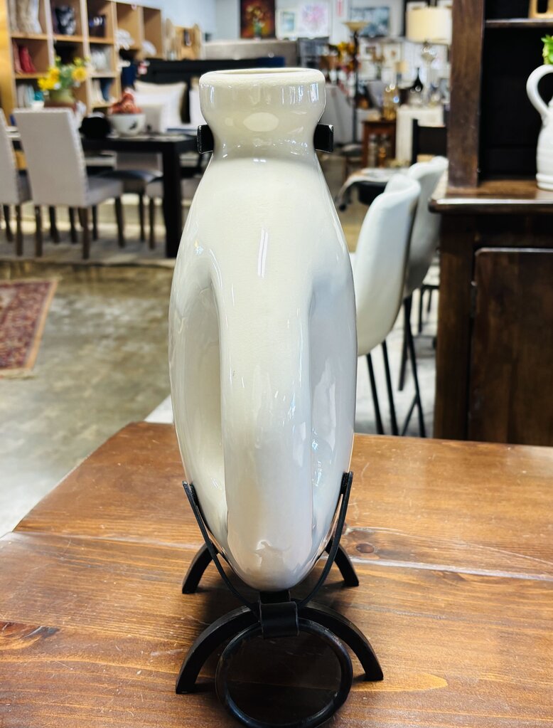 Canteen Style Vase Resting in Metal Stand