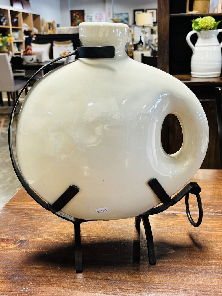 Canteen Style Vase Resting in Metal Stand