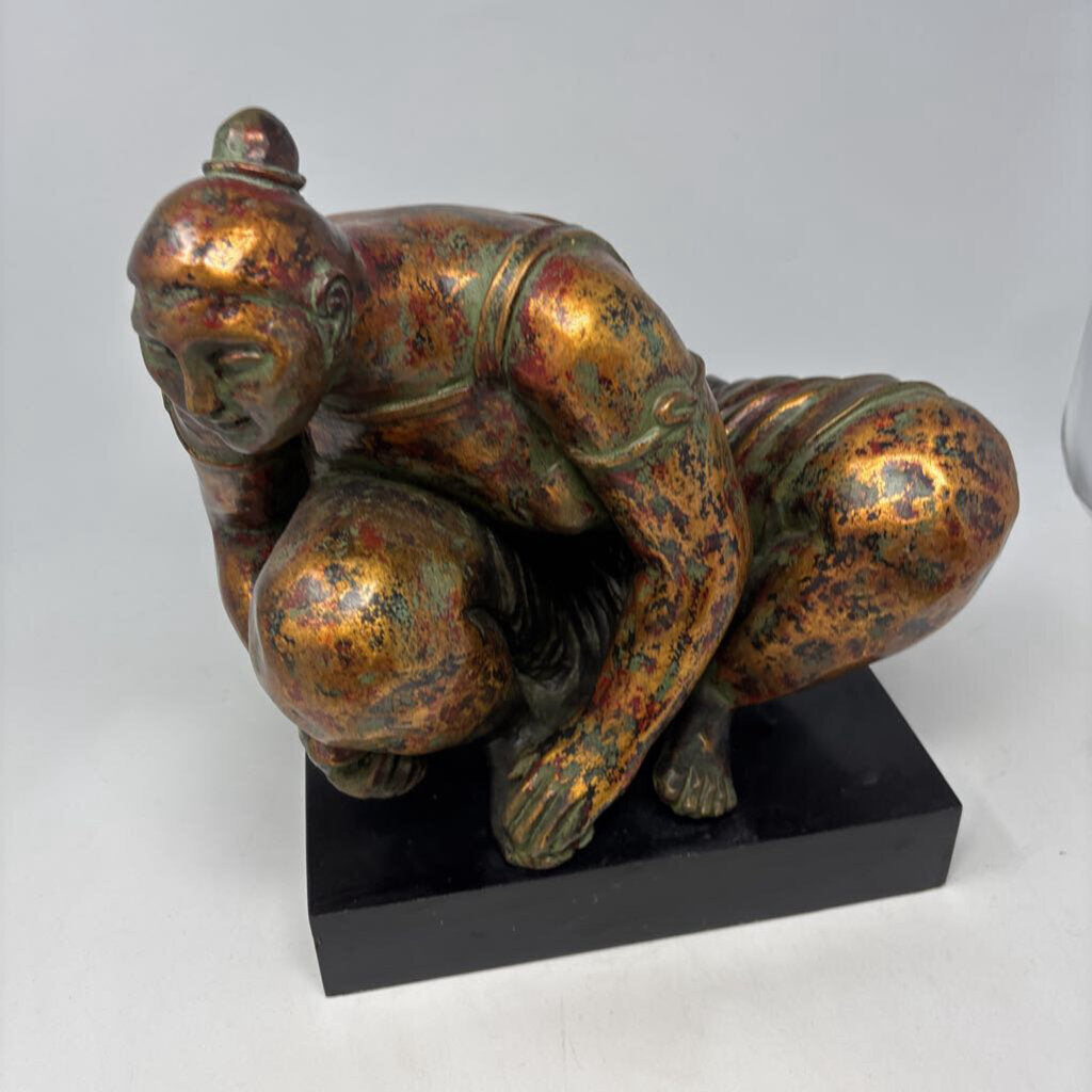Crouching Female Figure On Base