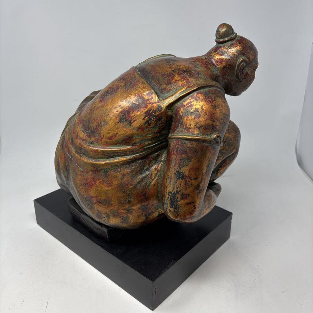 Crouching Female Figure On Base